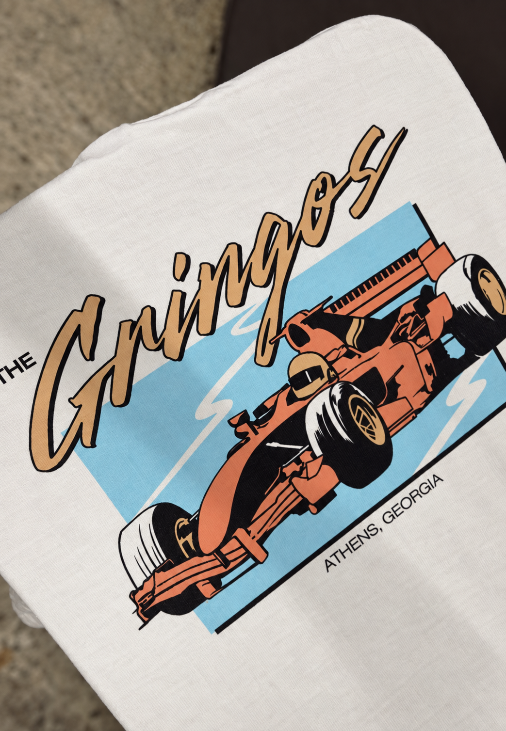 The Gringos shirt featuring race car artwork