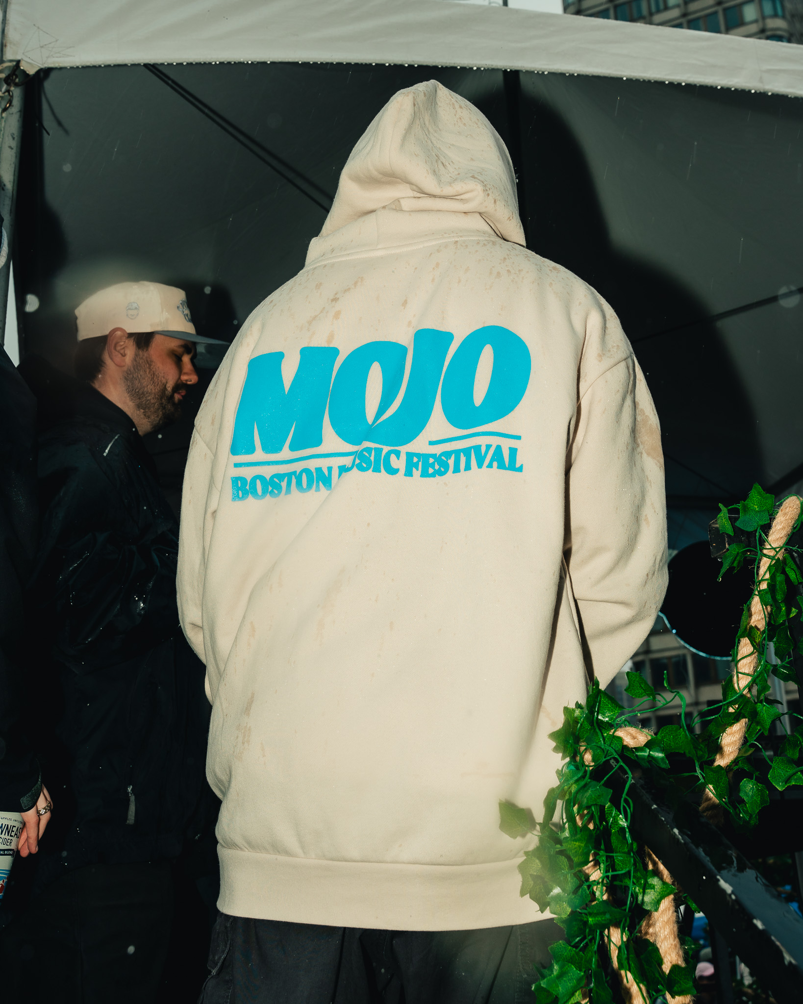 Blue MOJO Boston Music Festival artwork on a cream hoodie